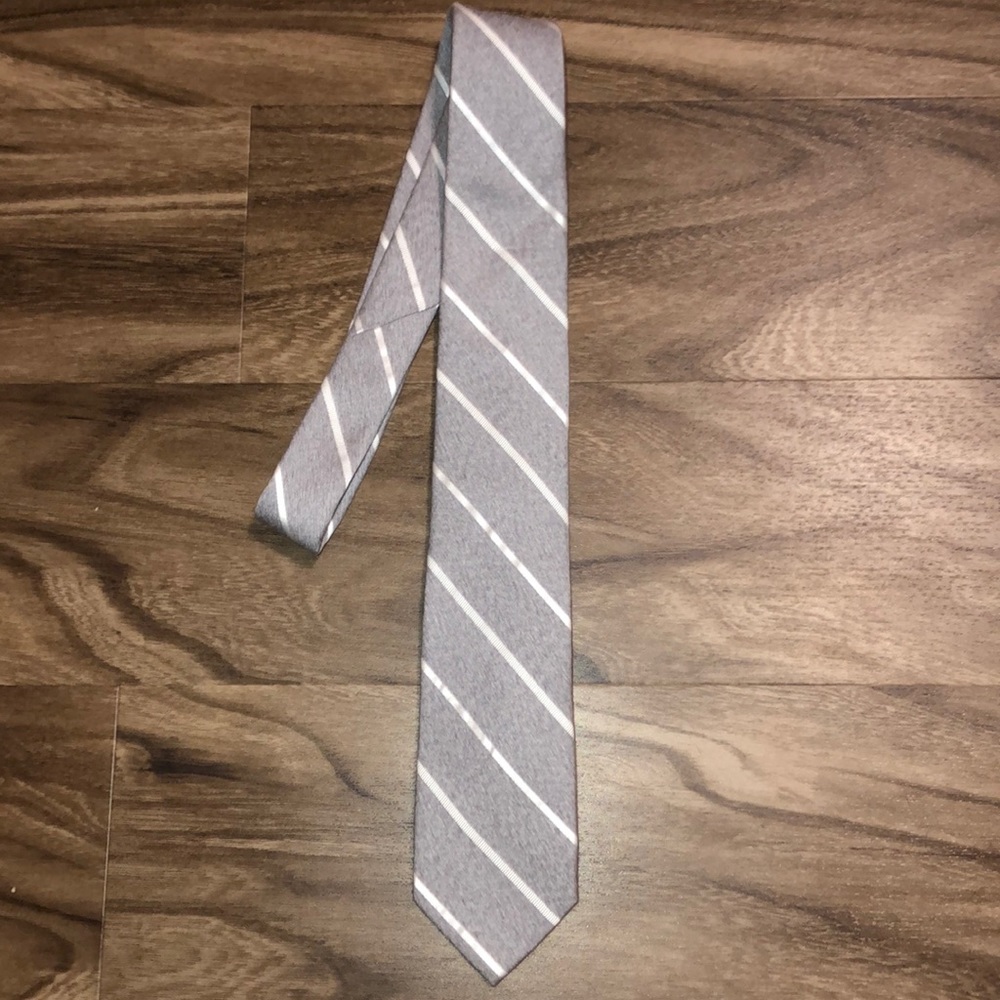 Gray and white striped tie